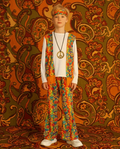Child wearing a 1970s hippie costume set with flared trousers